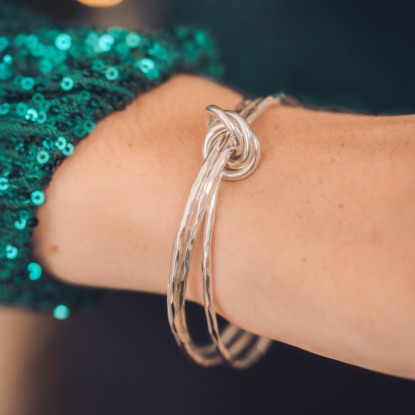 triple silver bangle with loop detail