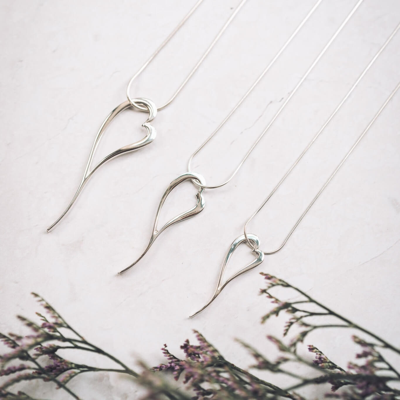 open heart pendant necklace on a solid chain