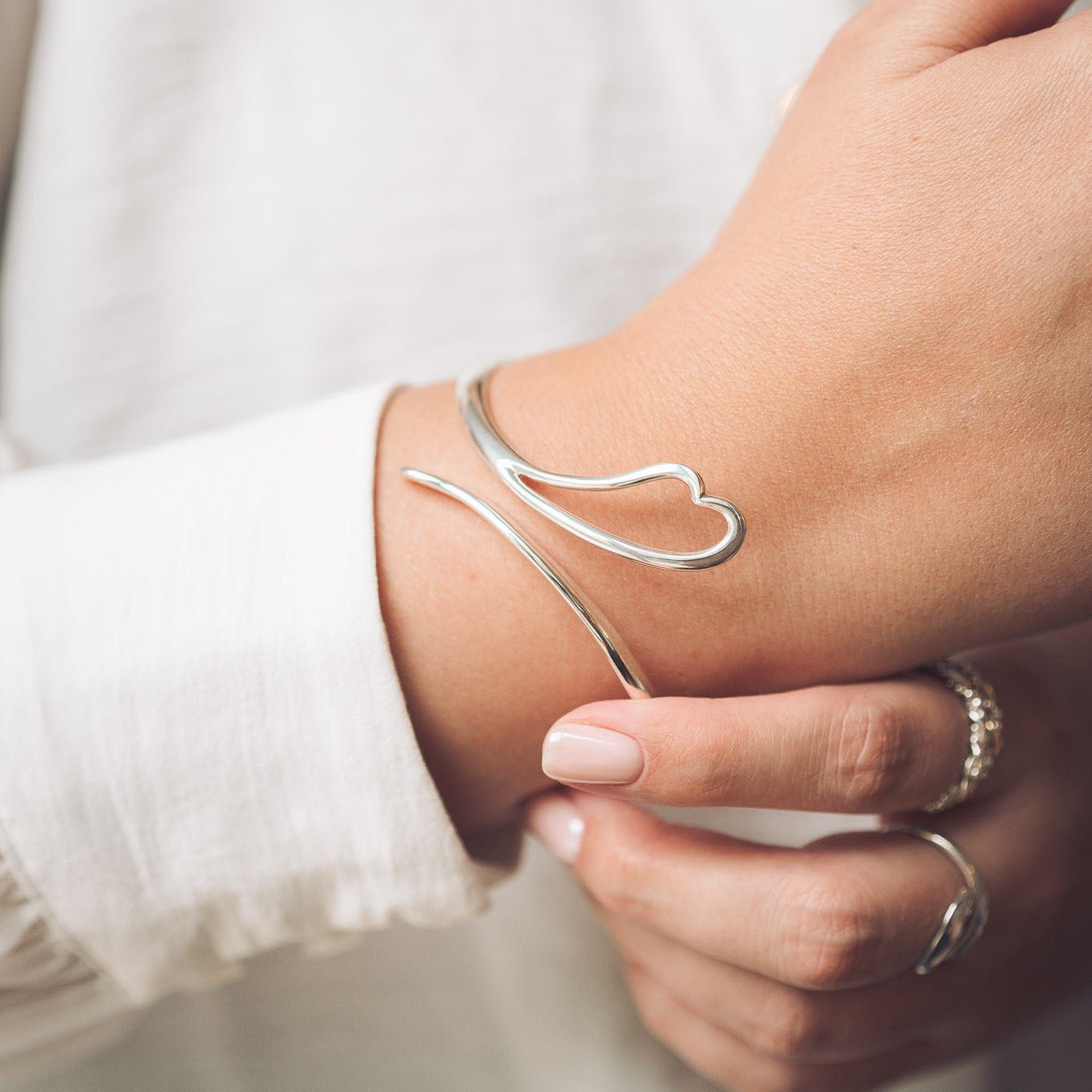 Handmade silver heart bangle