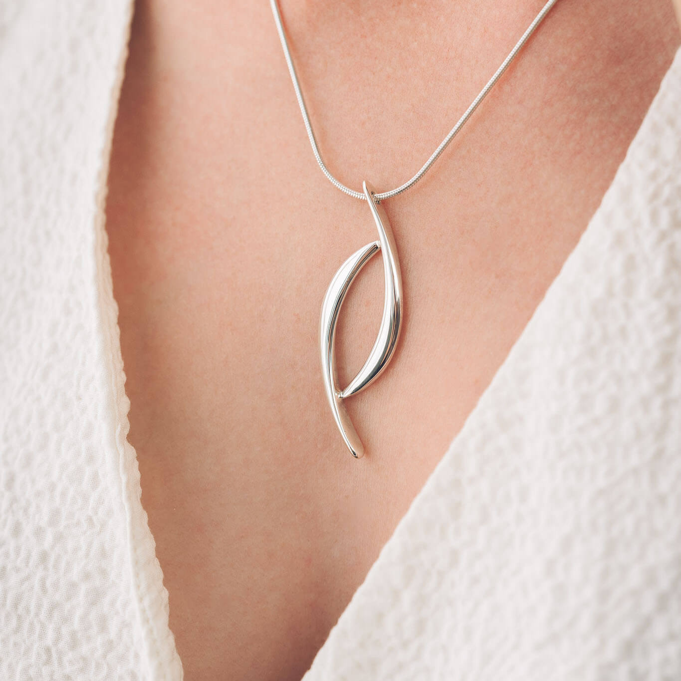 handmade sterling silver pendant on necklace