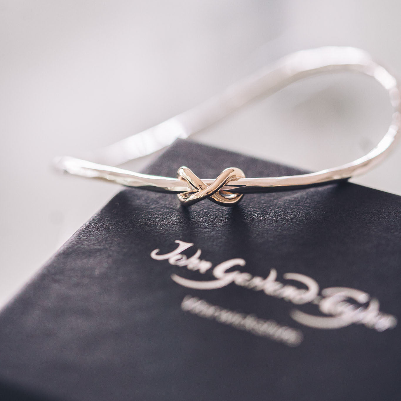 9ct Gold Infinity Knot On Our Classic Fairy Bangle