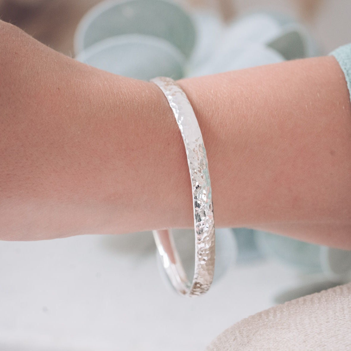 Handmade hammered silver bangle