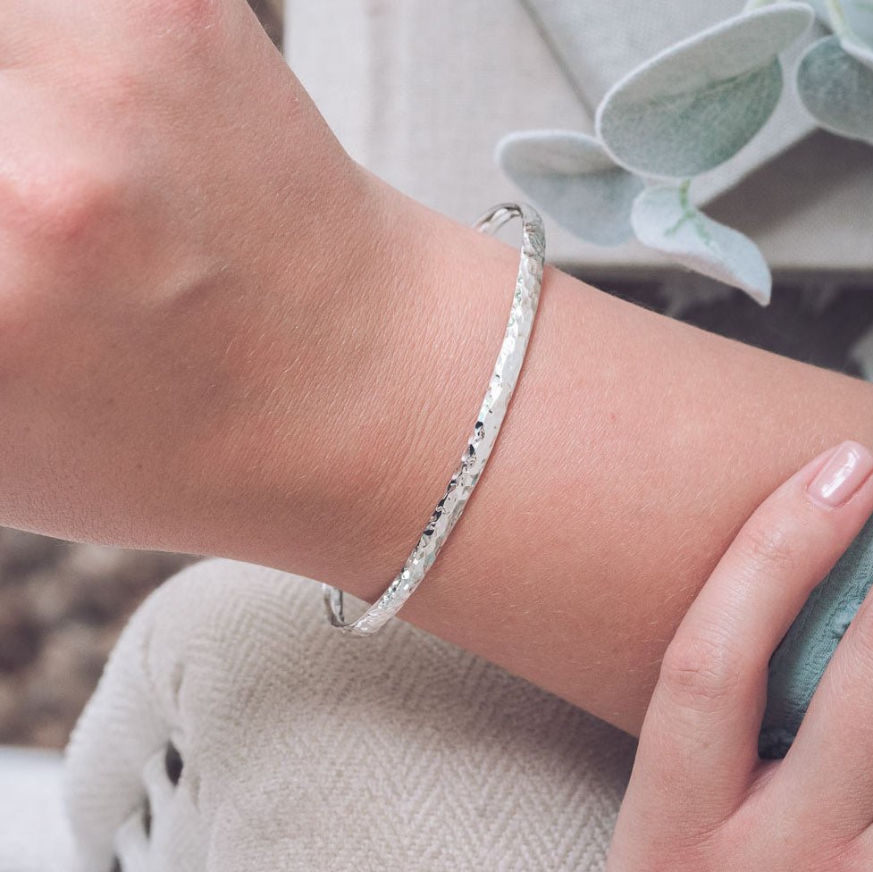 Handmade hammered silver bangle