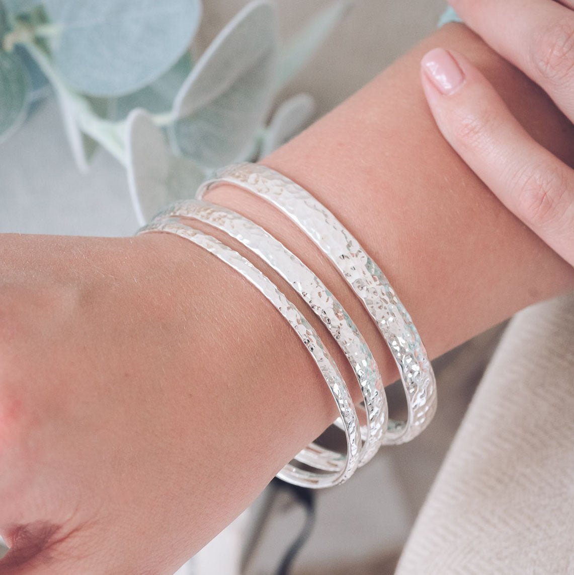 Handmade hammered silver bangle