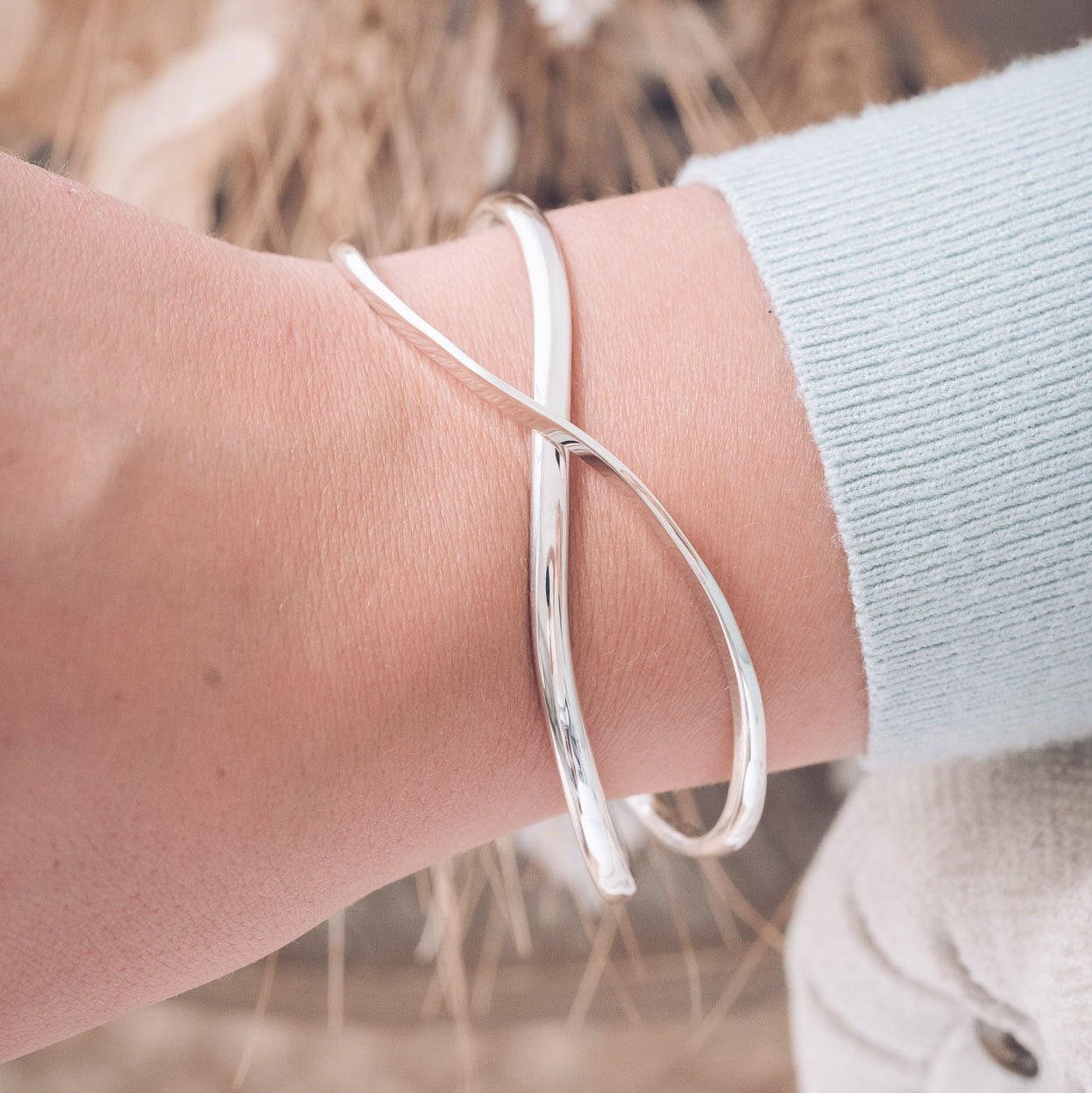 Handmade Silver Isla Bangle with Crossover design