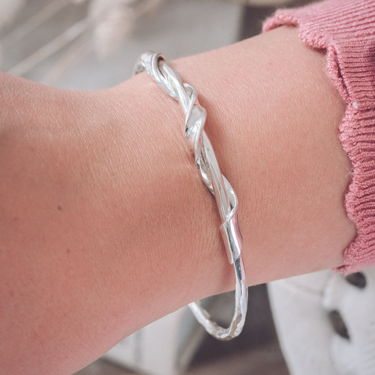 Handmade Silver Textured Bangle With Twisted Ribbon Detail