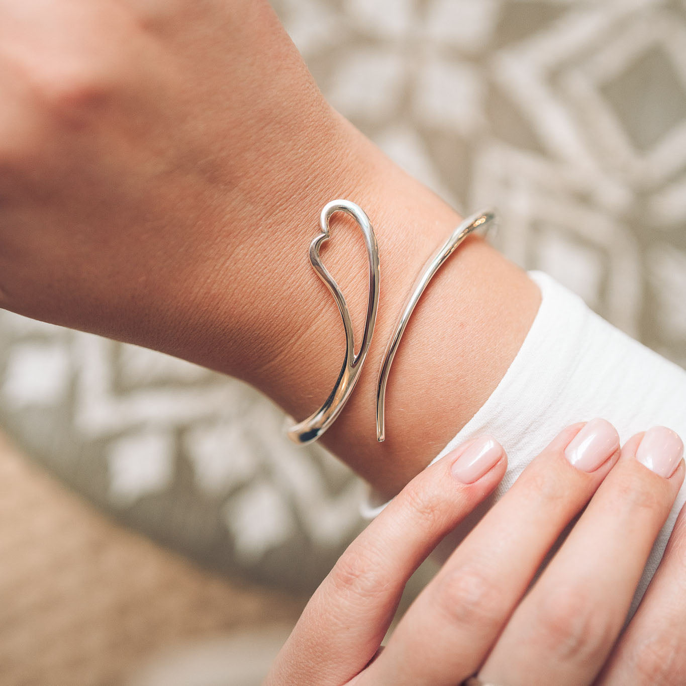 Handmade silver heart bangle