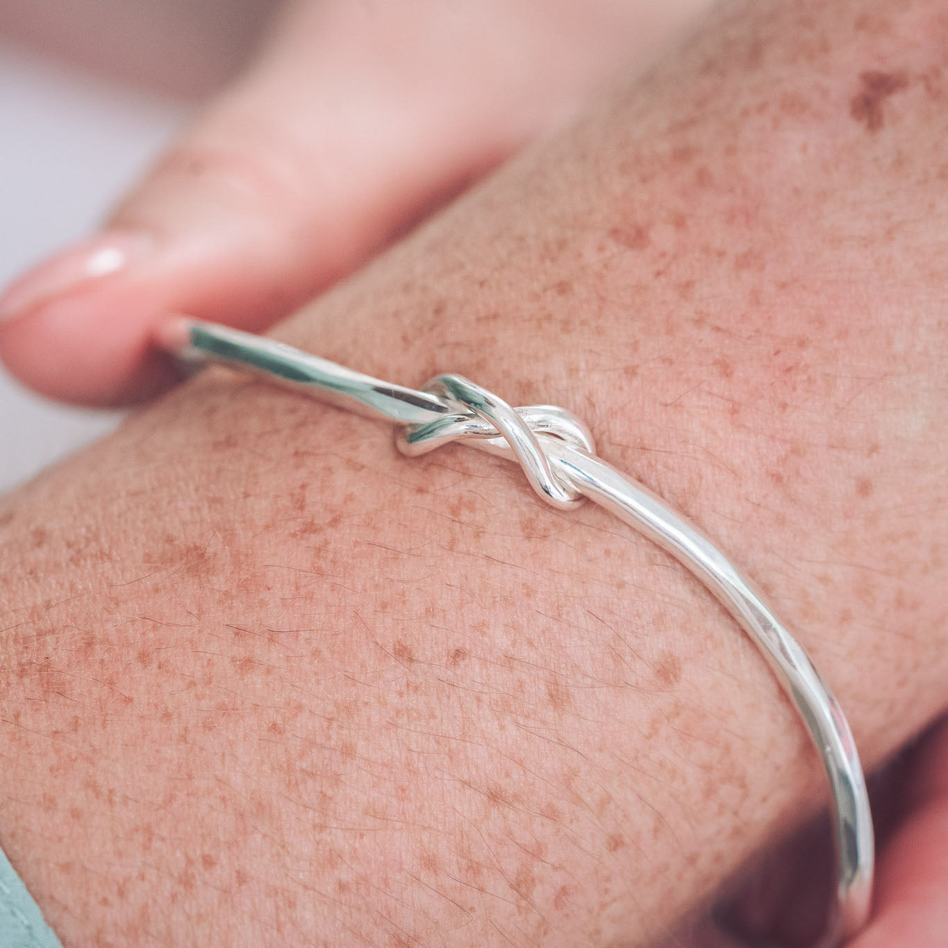 Infinity knot bracelet on sale silver